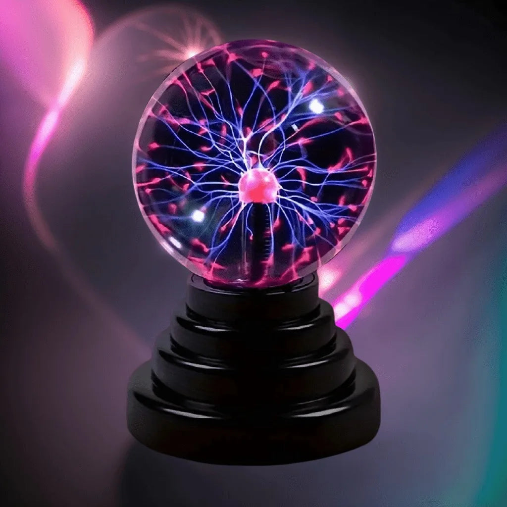 tesla coil ball glowing with pink and blue plasma tendrils