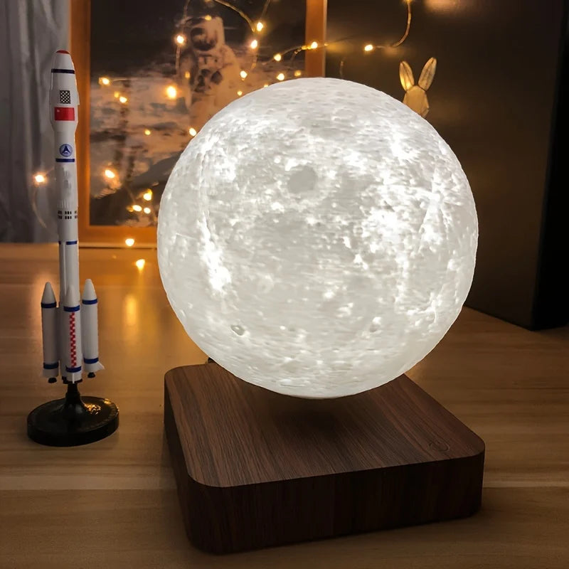 levitating moon lamp hovering above wooden base with space-themed desk decor