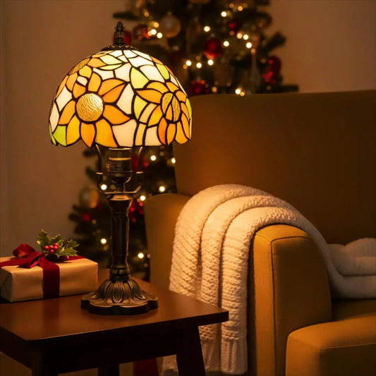 stained glass lamp with yellow sunflower design glowing warmly in a cozy living room