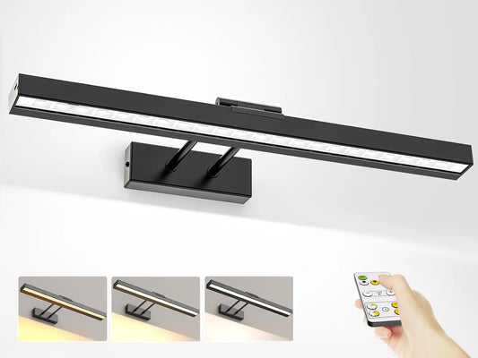 picture light mounted above framed artwork on wall