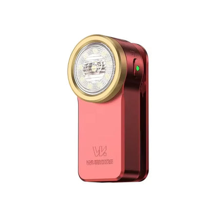 mini flashlight in deep red with gold bezel accent