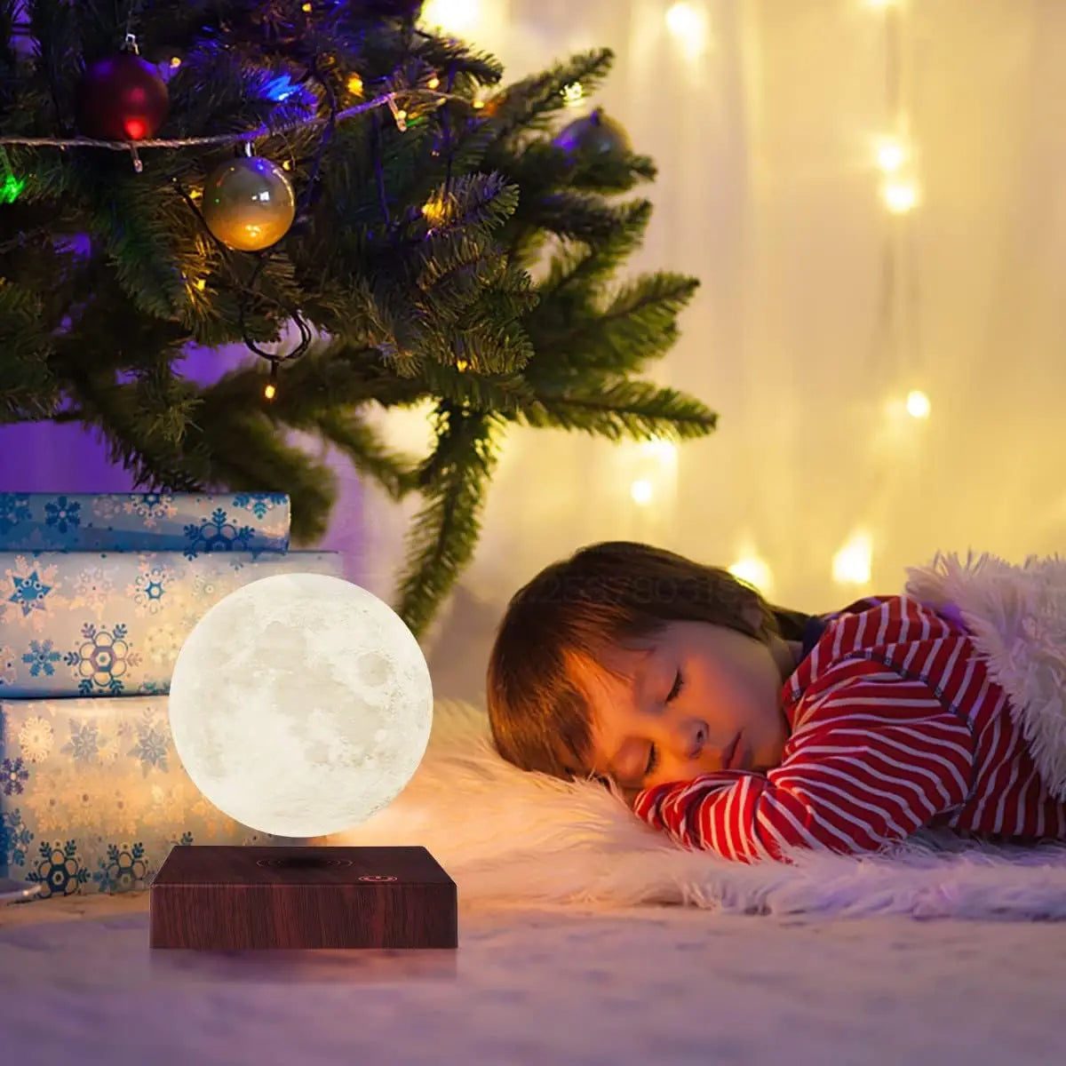 3D printed moon lamp warm glow as gift with child sleeping peacefully
