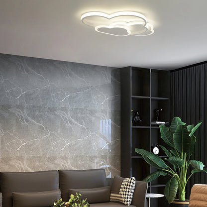 cloud light fixture installed in modern adult living room with marble wall