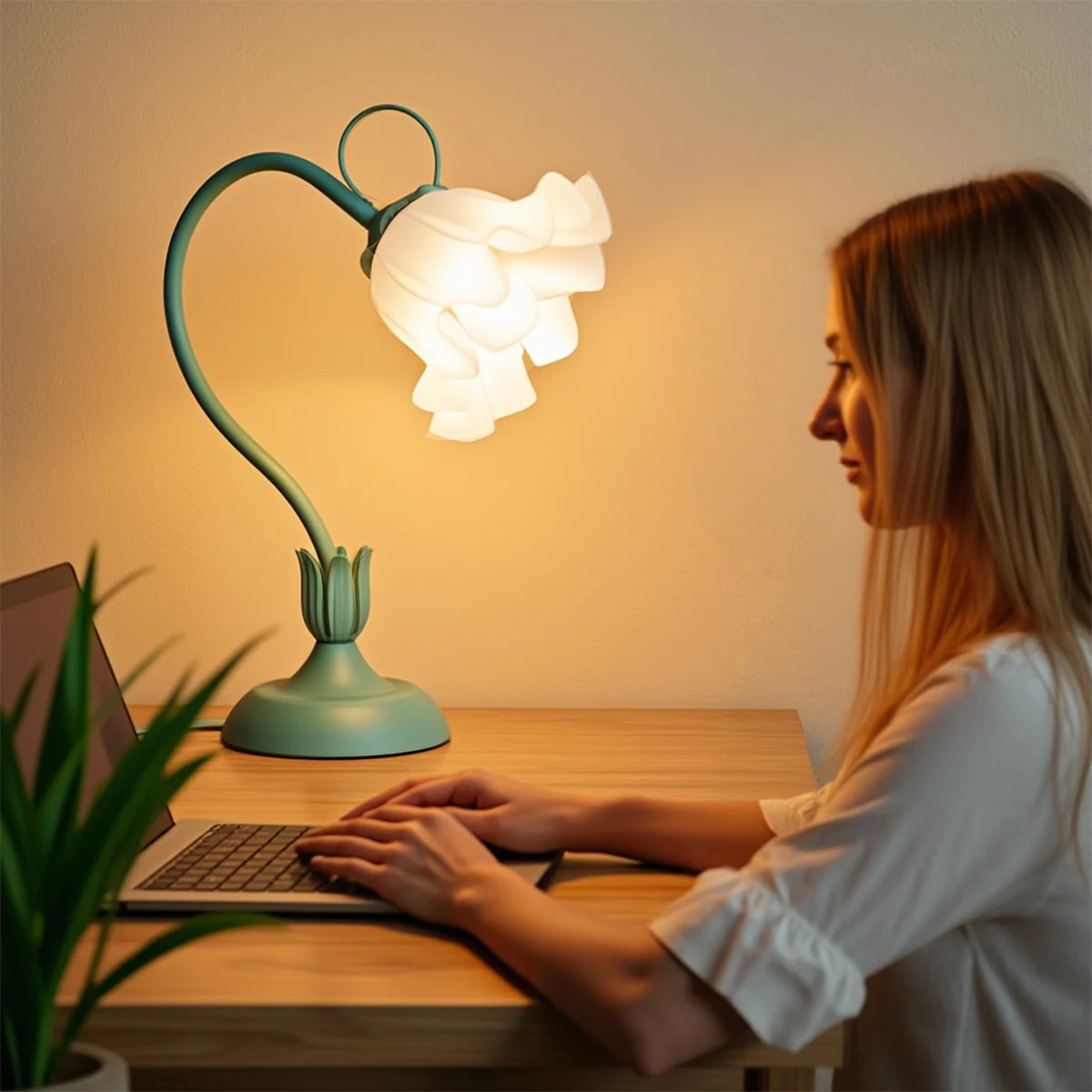 Blooming flower lamp illuminating a desk workspace at night
