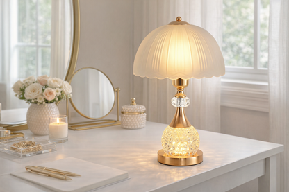 crystal desk lamp on elegant vanity setup with gold decor accents and warm ambient lighting