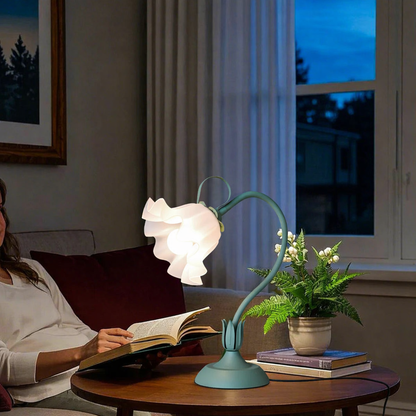 Flower pot lamp providing comfortable reading light on a sofa side table