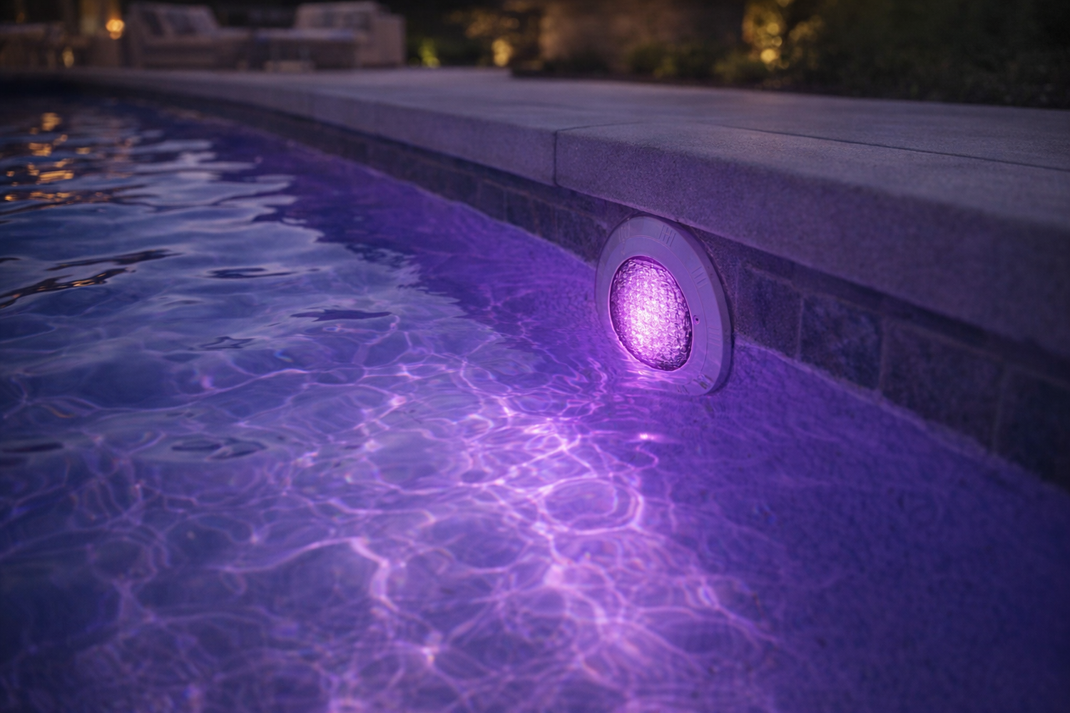 led swimming pool light glowing rich purple underwater with caustic light patterns