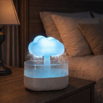 cloud humidifier glowing blue on cozy bedroom nightstand